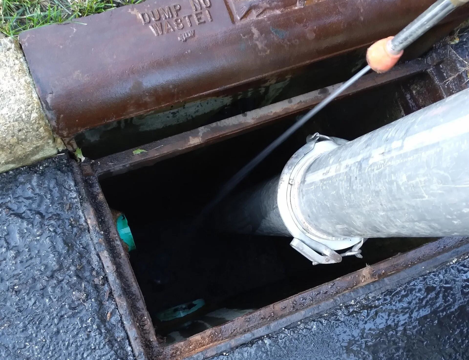 Vac truck hydro-jetting a storm main